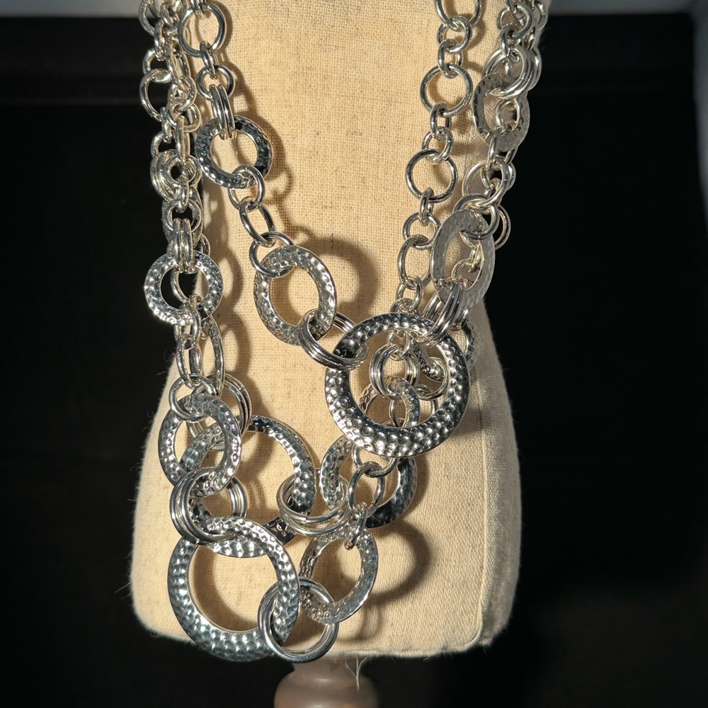 Lia Sophia Multichain necklace and earring set.